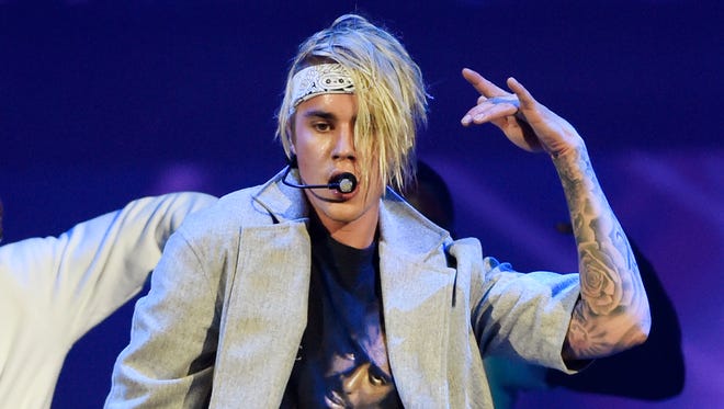 Justin Bieber performs during his Purpose World Tour on March 20, 2016, in Los Angeles.