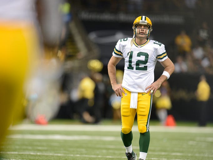 Green Bay Packers quarterback Aaron Rodgers shows his