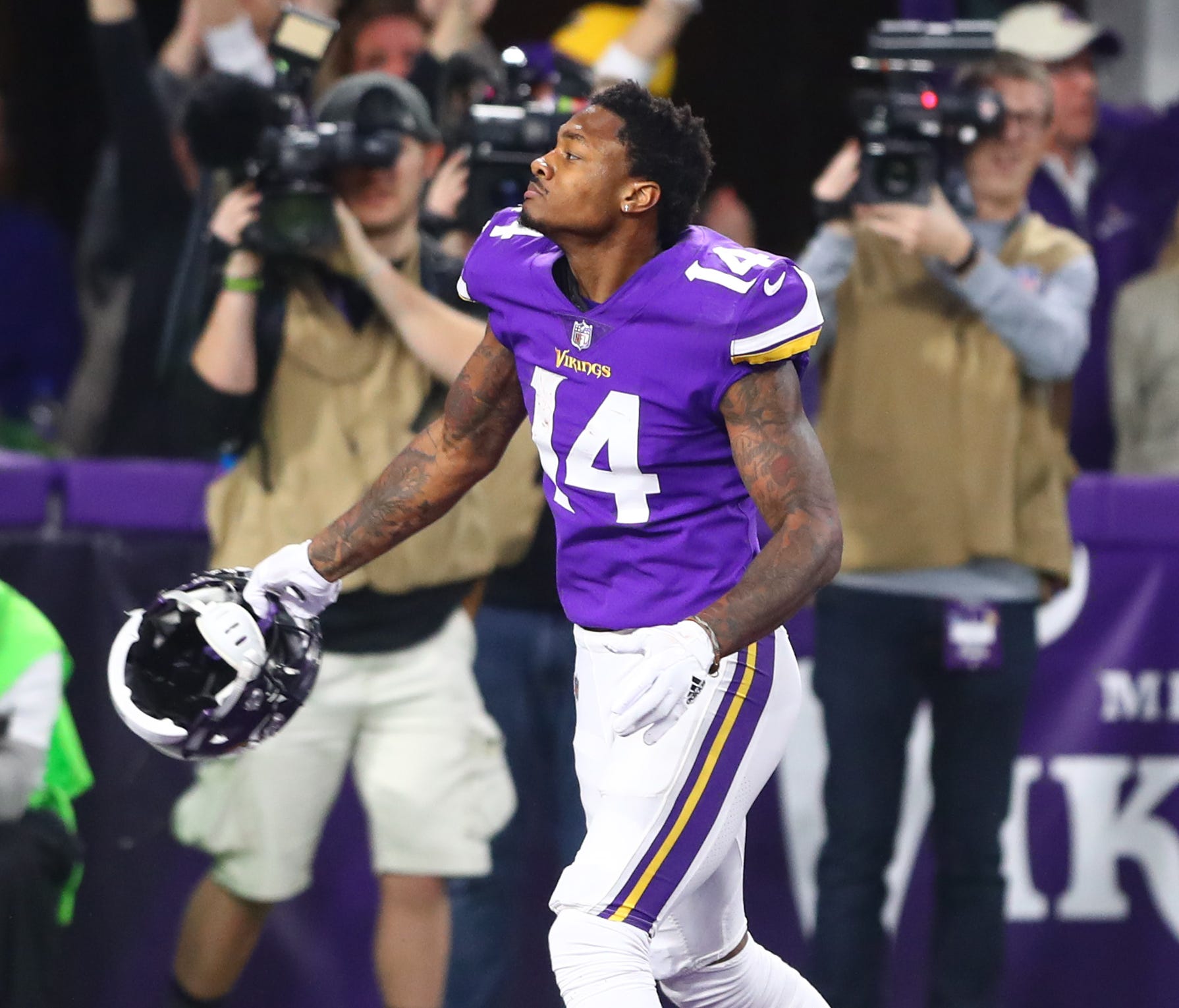 Minnesota Vikings wide receiver Stefon Diggs celebrates after catching the game winning catch against the New Orleans Saints at U.S. Bank Stadium.
