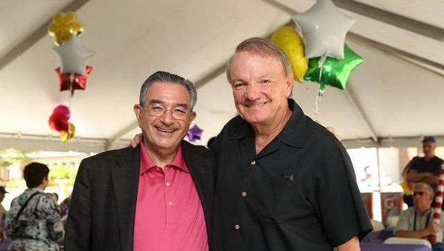 David Sharon, M.D., medical director of the Leon Hess Cancer Center at Monmouth Medical Center, gathers with cancer survivors Irving and Diana Steinfeld at the Cancer Survivor Party hosted by Monmouth