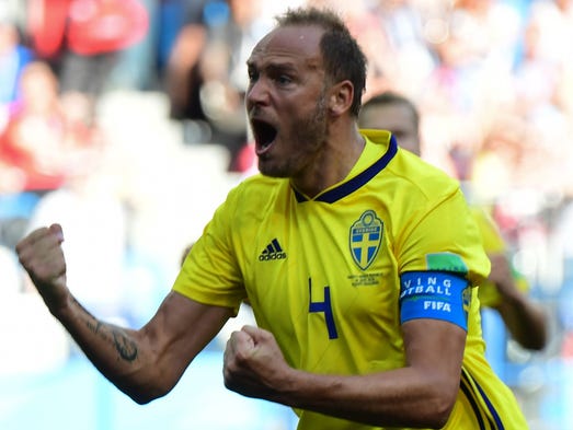 Sweden's defender Andreas Granqvist celebrates after