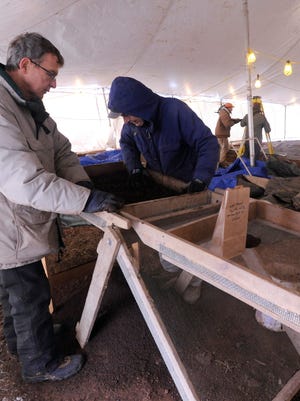 Archaeology volunteers excavated the site of a small American Indian mound in February at the Guernsey Crossing development on North Bridge Street.