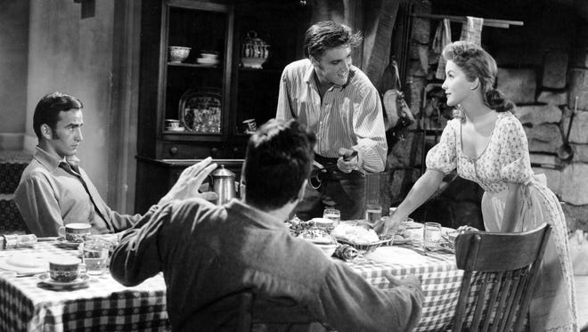 Elvis and Debra Paget set upon each other in the Civil War-era "Love Me Tender." The film is one of just two Elvis movies in which his character dies at the end.