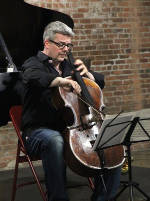 Cellist Paul Watkins, artistic director of the Great Lakes Chamber Music Festival, performs at Wasserman Projects in Detroit on June 17.
