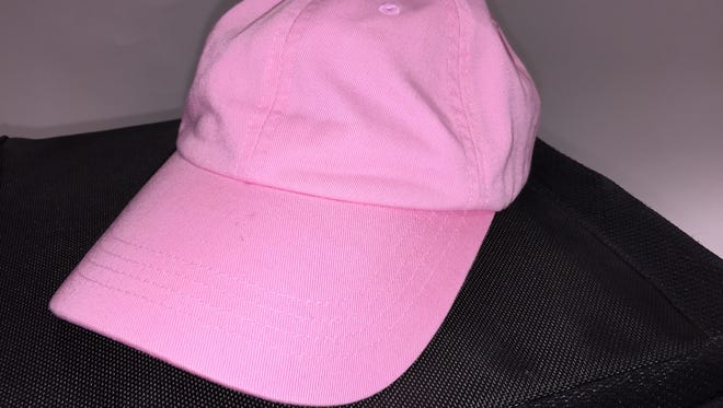Dawn Dugle wears the same pink hat to Fit4Change every day (yes, she does wash it!). She is known as the "Pink Hat Girl".
