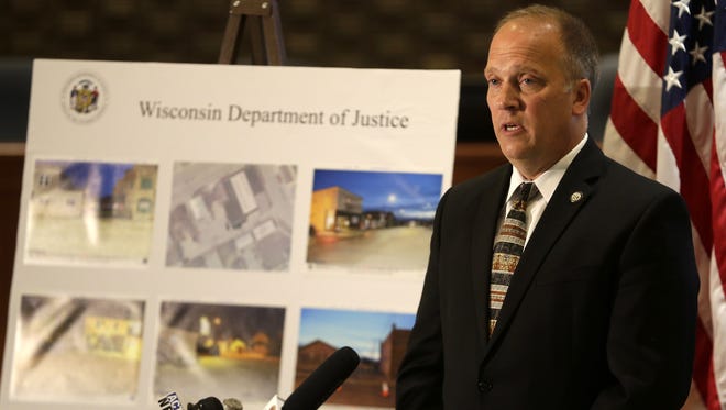 Wisconsin Attorney General Brad Schimel announces in May that no charges will be filed against two Neenah police officers who shot and killed hostage Michael L. Funk.