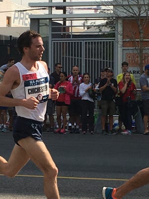 Mt. Morris native Tim Chichester at mile 9 of the Olympic Marathon Trials in Los Angeles on Feb. 13, 2016.