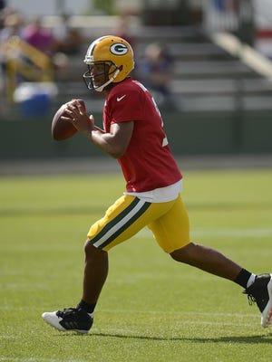 Green Bay Packers rookie quarterback Brett Hundley runs drills during training camp practice at Ray Nitschke Field.