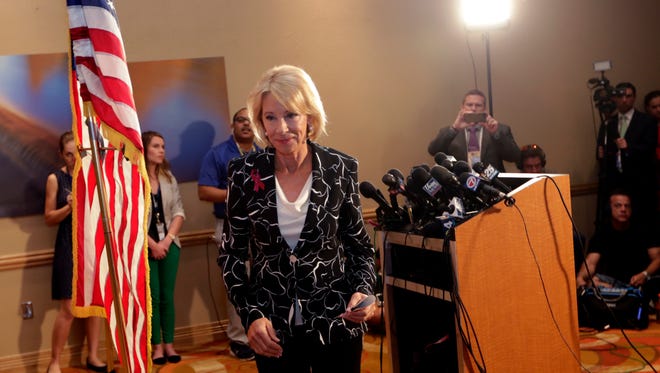 Secretary of Education Betsy DeVos speaks at a news conference following a visit to Marjory Stoneman Douglas High School in the aftermath of a Feb. 14 mass shooting at the school, Wednesday, March 7, 2018, in Coral Springs, Fla.