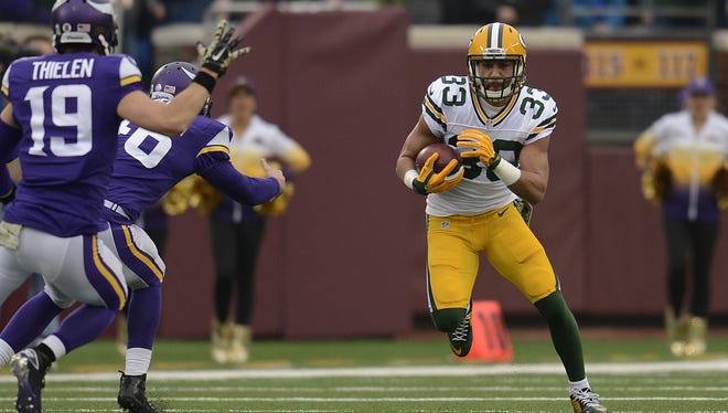 Green Bay Packers' Micah Hyde (33) runs with the ball during a kick-off return against the Minnesota Vikings during Sunday's game at TCF Bank Stadium on the campus of the University of Minnesota in Minneapolis. Evan Siegle/Press-Gazette Media
