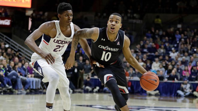 Cincinnati Bearcats guard Troy Caupain (10) drives the ball against Connecticut Huskies forward Juwan Durham (23) in the second half at Harry A. Gampel Pavilion on March 5.