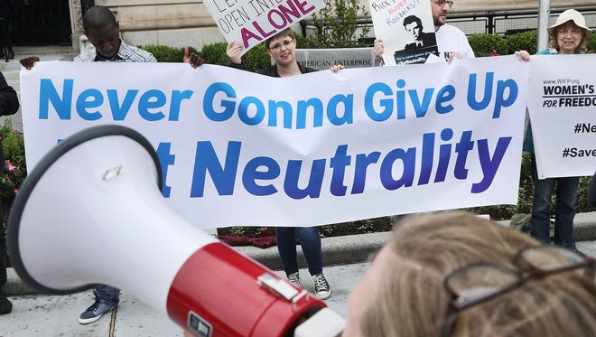 Proponents of net neutrality protest in Washington, D.C. on May 5, 2017.