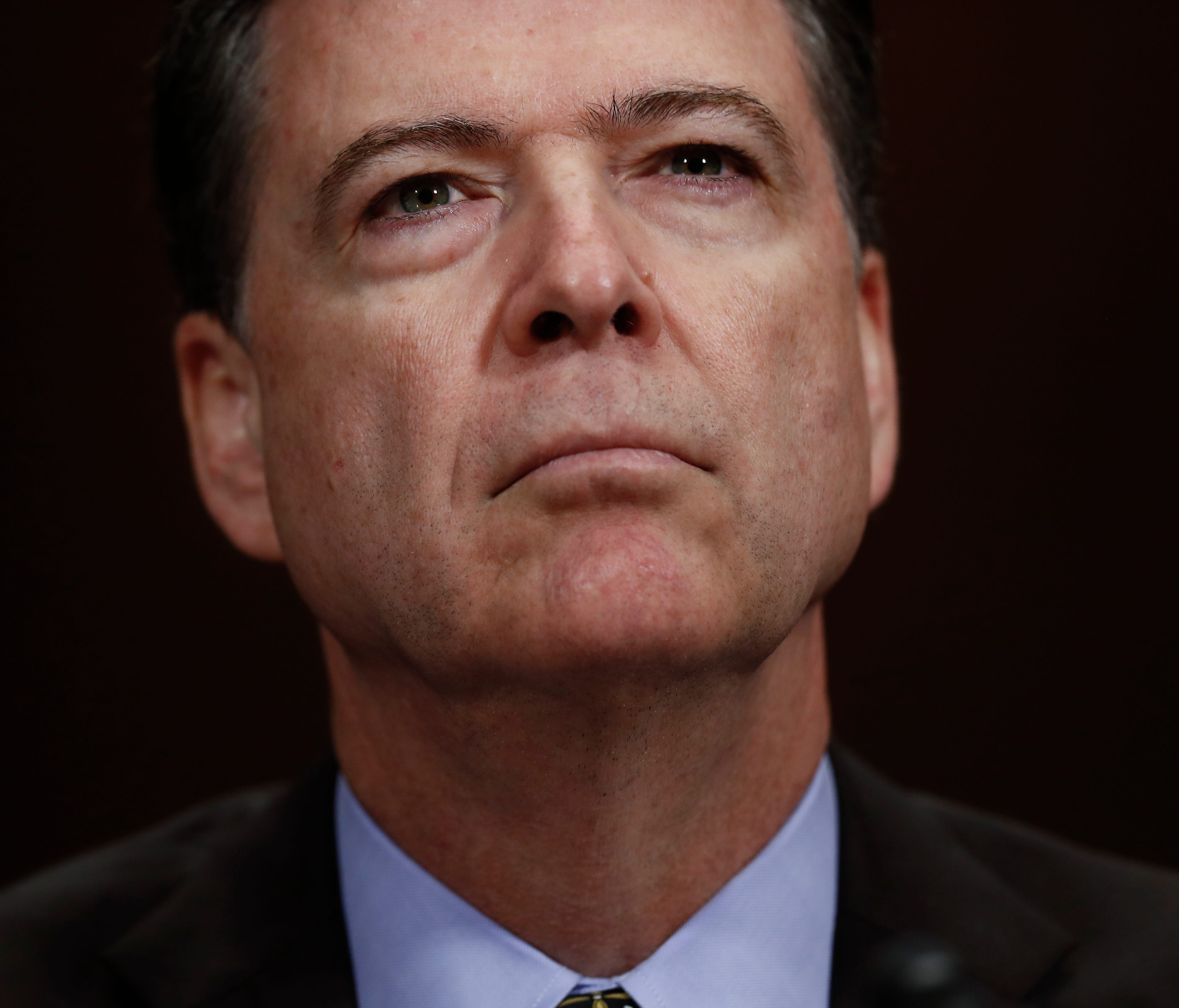 Former FBI Director James Comey is pictured testifying before a Senate Judiciary Committee hearing.