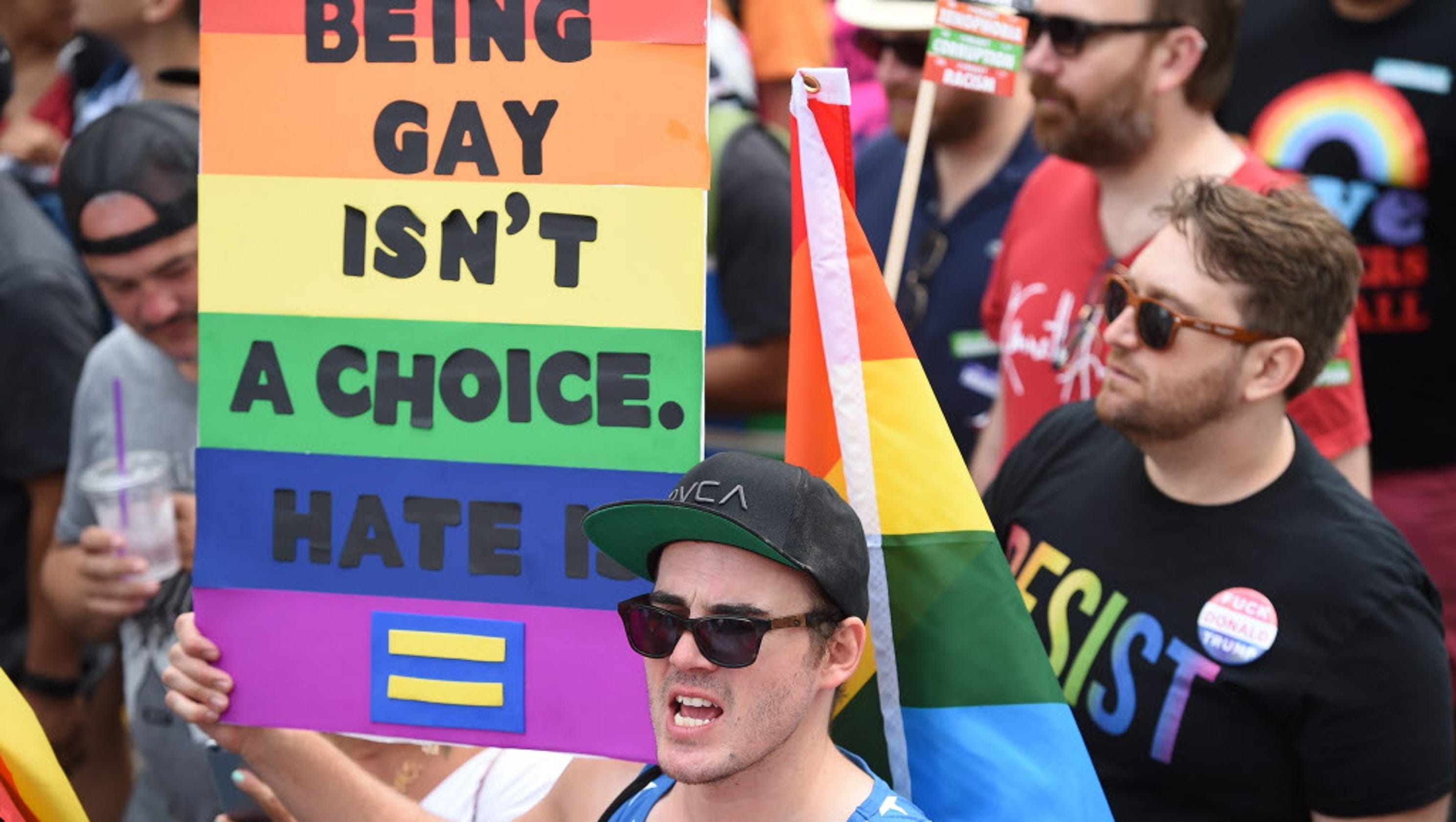 LGBTQ community marches for equal rights and to stand up against Donald ...