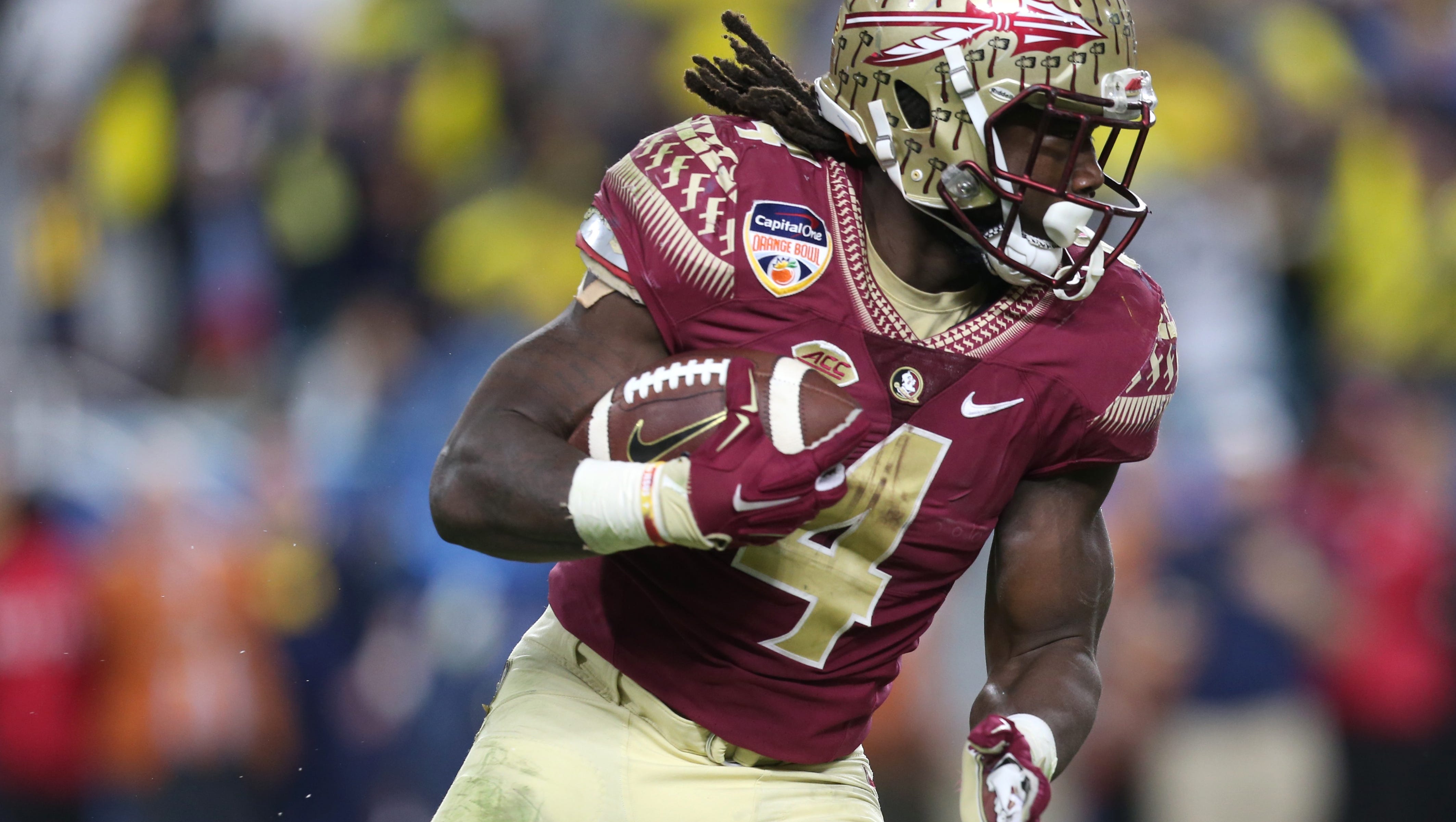 With Hood Former FSU Star Dalvin Cook Slips Out Of NFL Draft First