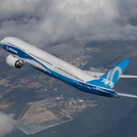 A Boeing Dreamliner in flight.