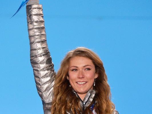
Gold medalist Mikaela Shiffrin of the United States celebrates during the medal ceremony for the Women's Slalom on Day 15 of the Sochi 2014 Winter Olympics at Medals Plaza on February 22, 2014 in Sochi, Russia.
