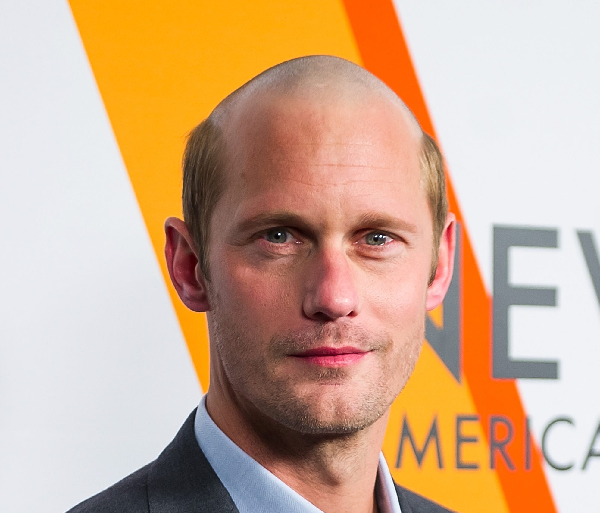 Alexander Skarsgard debuted his new 'do on the red carpet for the Volez, Voguez, Voyagez - Louis Vuitton Exhibition opening.
