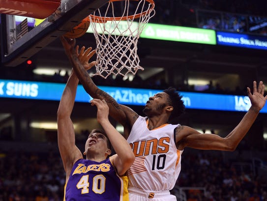Derrick Jones Jr. blocks a layup attempt by Lakers