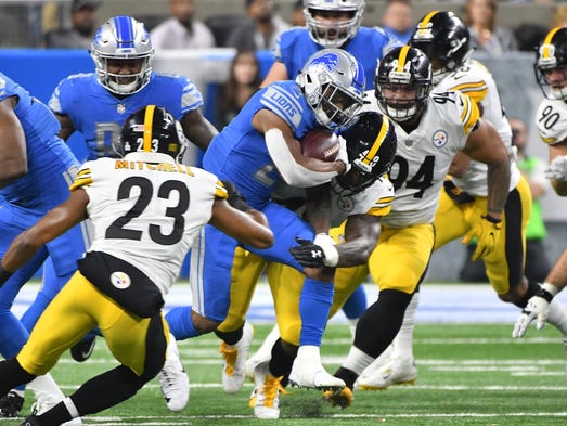 Lions running back Ameer Abdullah works through the