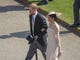 Prince Harry, dressed in a morning coat, and his bride,