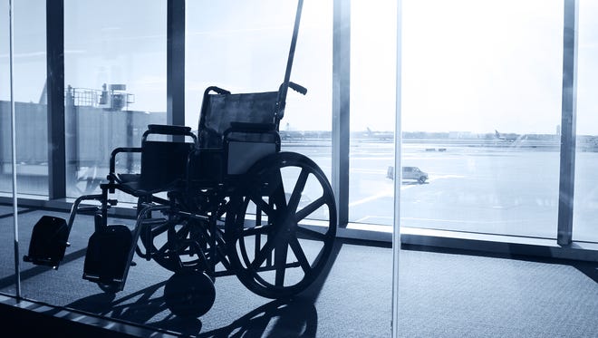 Wheelchair Service in Airport Terminal. Window View with Sunlight.
