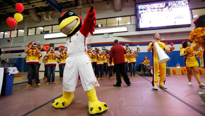 Cy the Cyclones mascot tries to pump up the crowd Saturday, March 19, 2016 during the ISU Alumni Association's Second-Round Spirit Rally at the Auraria Event Center in Denver.