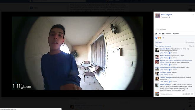 A screenshot of a video that Erika Grijalva posted of a man she said broke into her home with an ax.