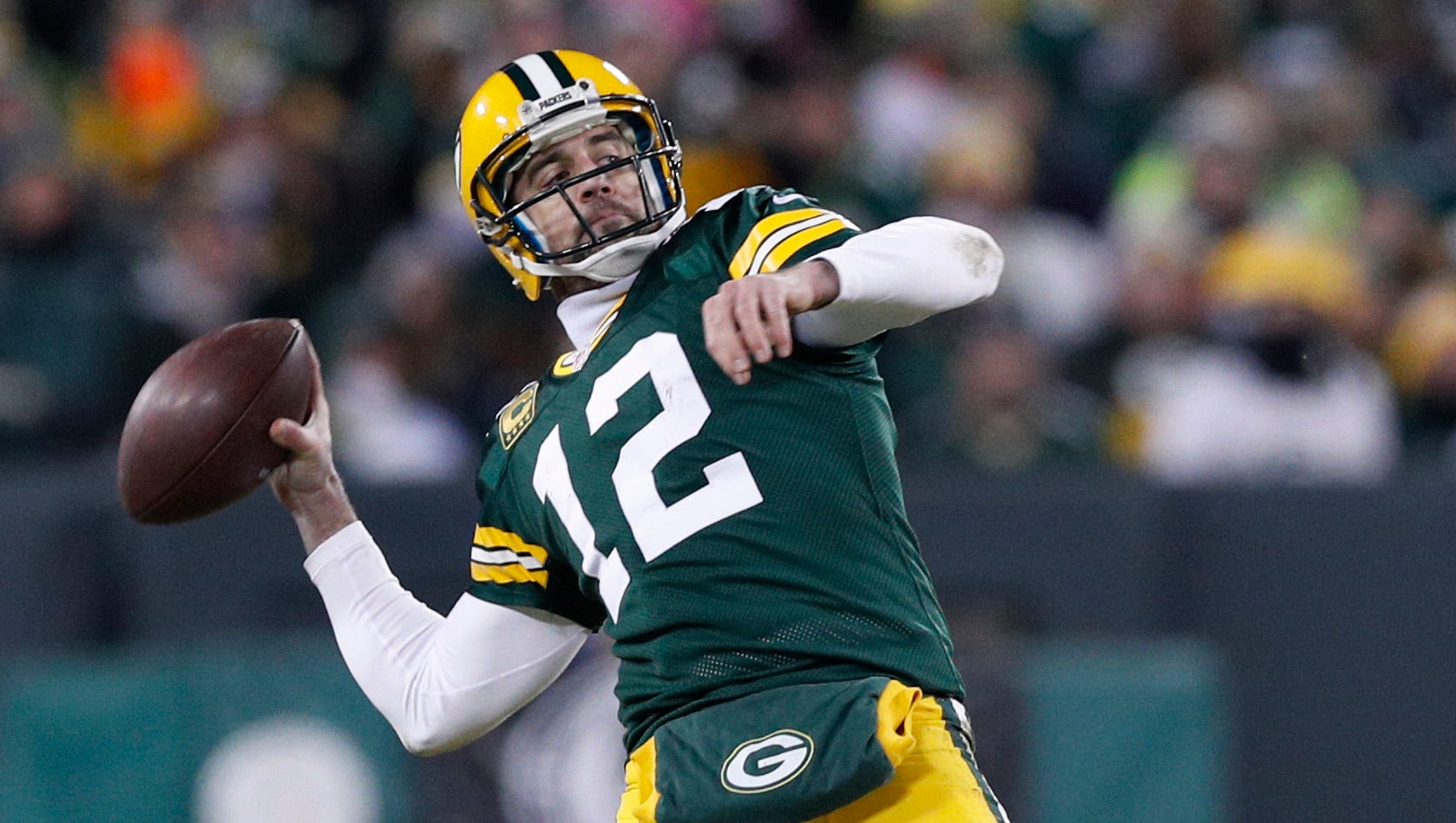 Aaron Rodgers completes another Hail Mary pass, and Lambeau goes crazy