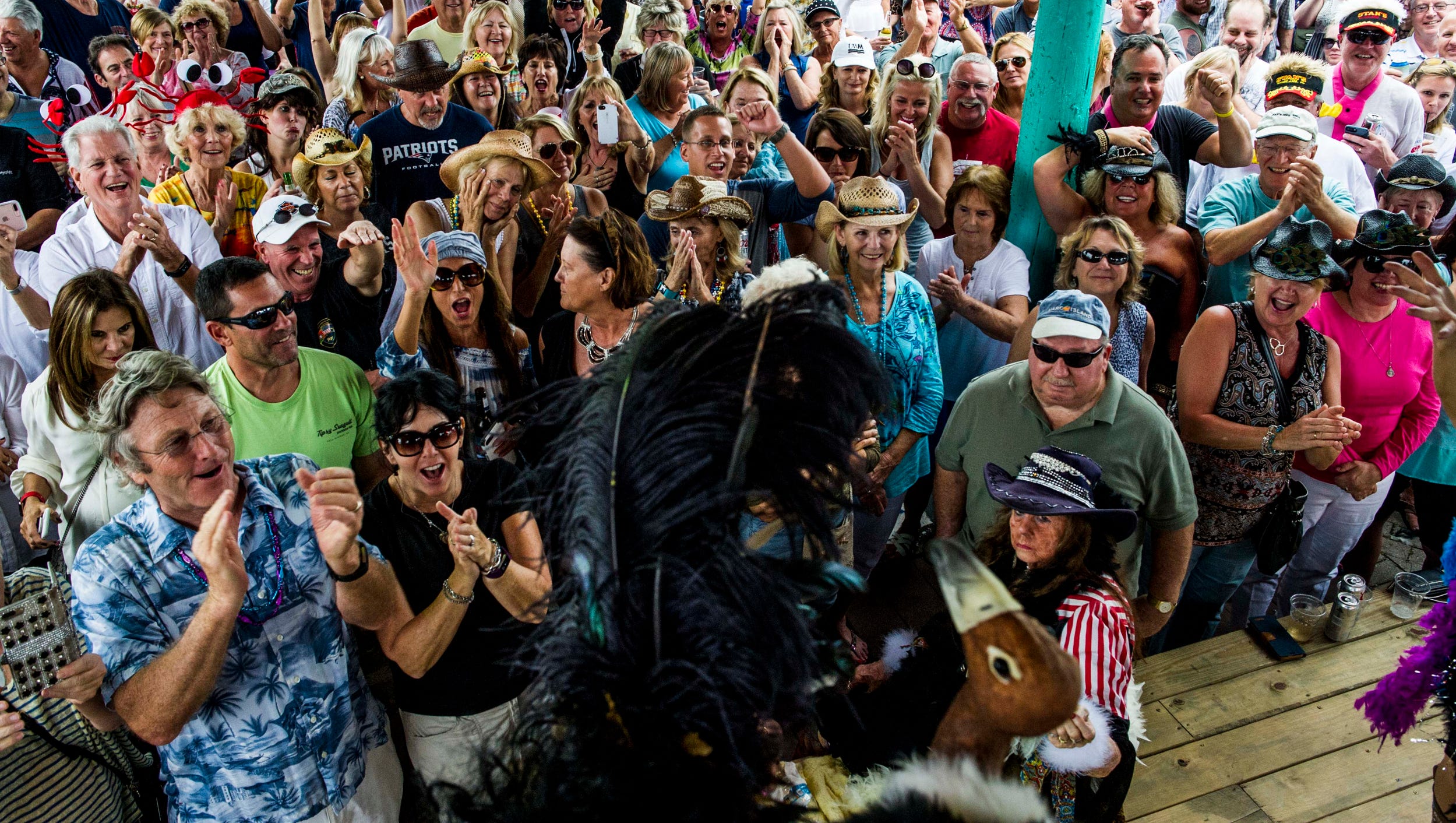 Buzzard Lope queen crowned as thousands crowd Goodland for Mullet Fest