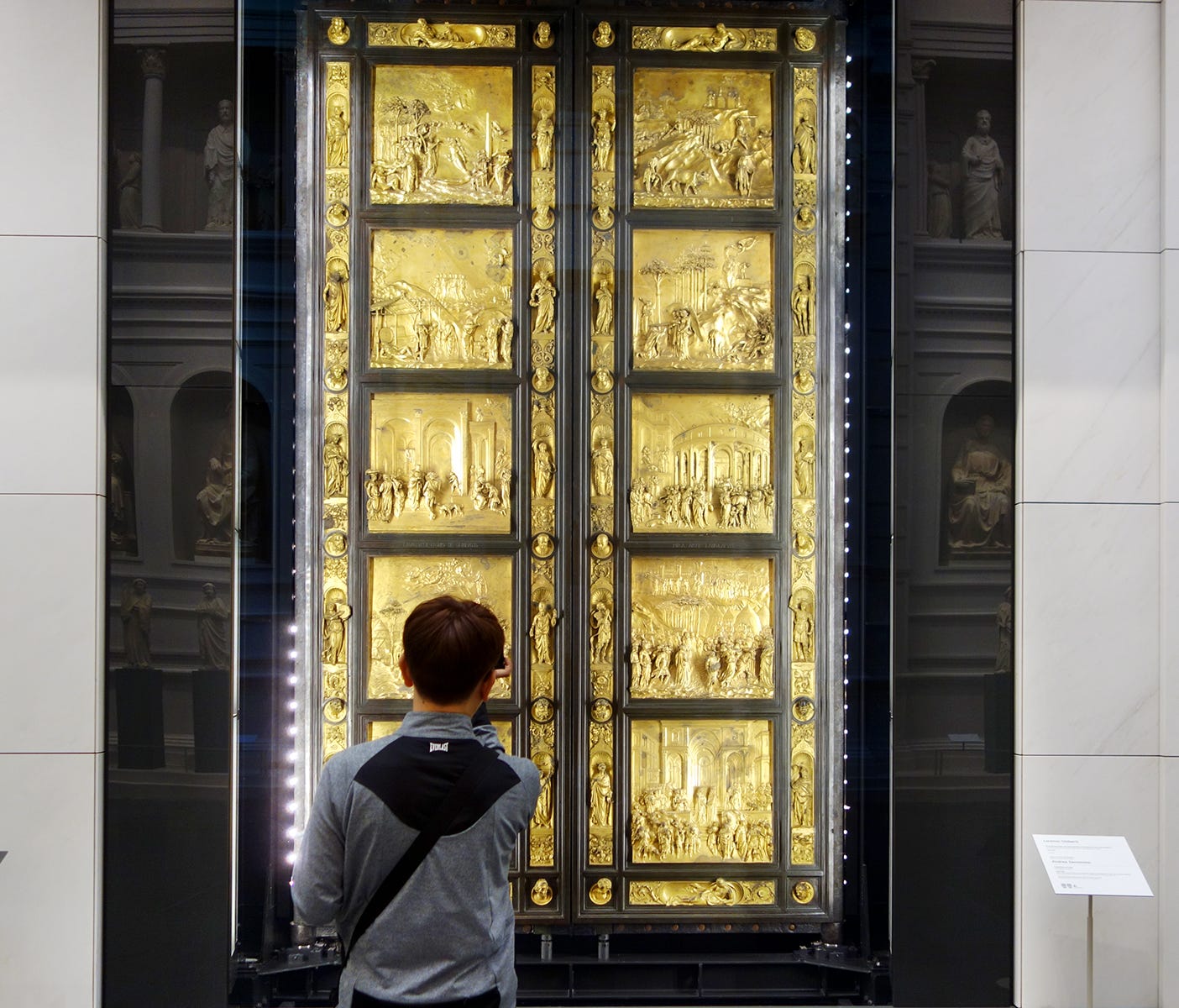 A visitor admires Lorenzo Ghiberti's 