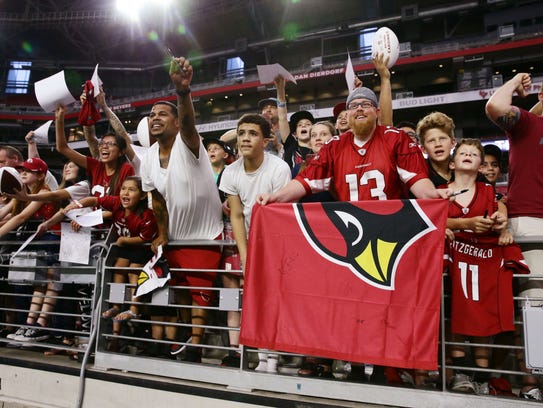 Arizona Cardinals fans cheer during the opening day