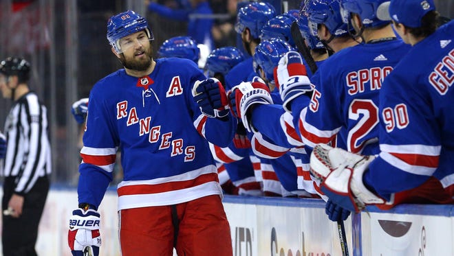 Feb 18, 2018; New York, NY, USA; New York Rangers left wing Rick Nash (61) celebrates with teammates after scoring a goal against the Philadelphia Flyers during the first period at Madison Square Garden.