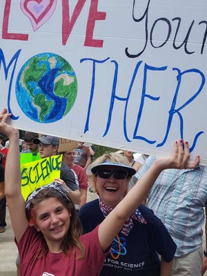 Fran Webb and granddaughter Mackenzie Webb marching for science in Tallahassee.