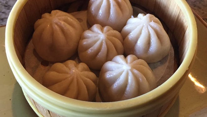 Xiao long bao, often called Shanghai soup dumplings, are on the dim sum menu at CaiE’s Oriental Café. The dumplings are filled with gelatinous pork that liquefies upon steaming, releasing a spurt of hot savory broth.