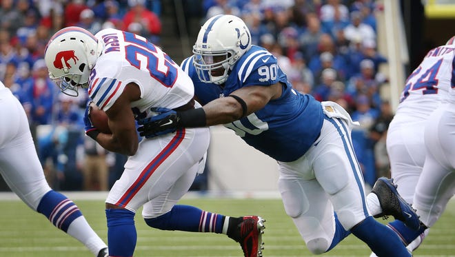 Indianapolis Colts defensive end Kendall Langford (90) chases down Buffalo Bills running back LeSean McCoy (25) in the first quarter of their game Sunday, September 13, 2015 at Ralph Wilson Stadium in Orchard Park NY.