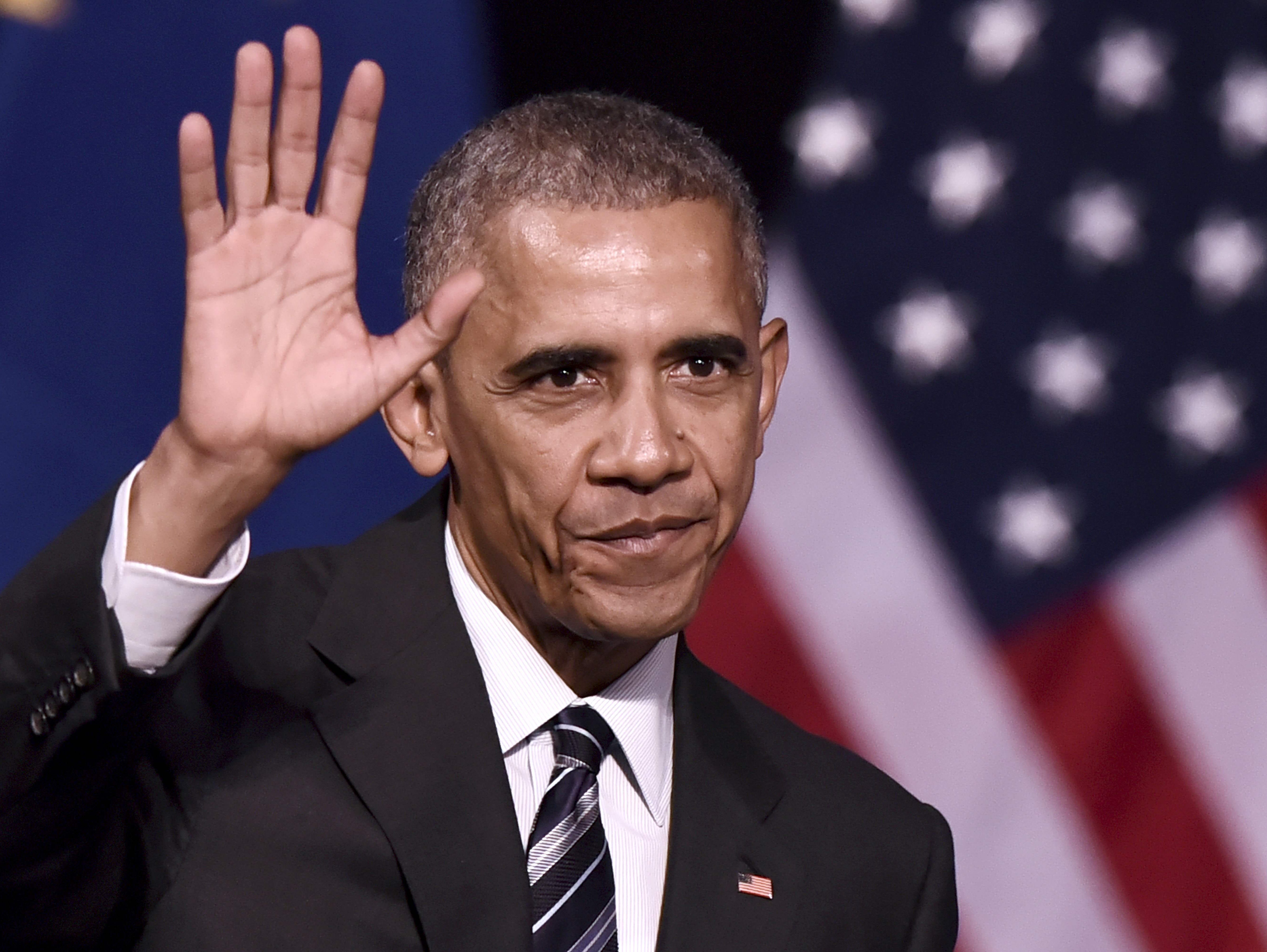President Obama waves to the crowd after delivering a speech at the Niarchos foundation in Athens on Nov. 16, 2016 at the end of his official visit in Greece.