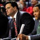 Arizona Wildcats head coach Sean Miller and assistant coaches Damon Stoudamire and Book Richardson on the bench for a Nov. 16, 2014, game.