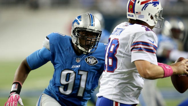 Detroit Lions defensive end Jason Jones pressures the Buffalo Bills QB Kyle Orton during second-quarter action at Ford Field in Detroit on Sunday.