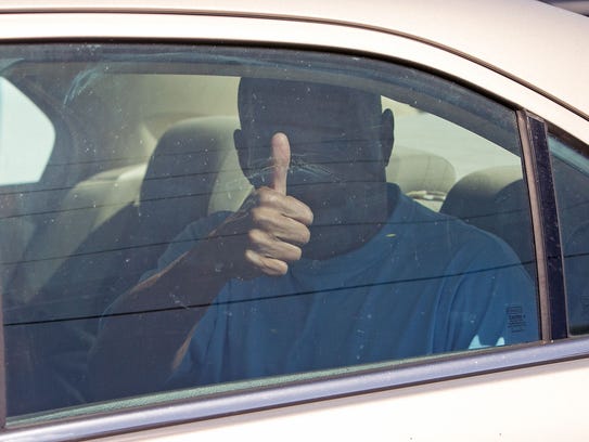 Louis Taylor gives the thumbs-up after being released
