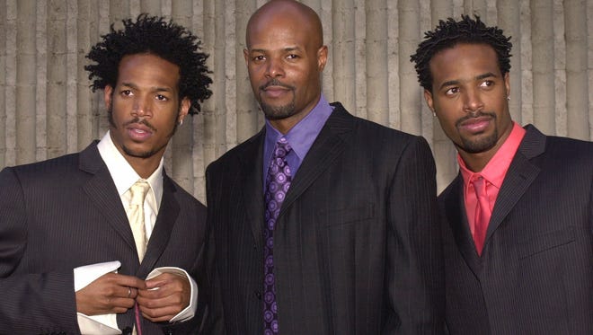 ** FILE ** Marlon Wayans, left, Keenan Ivory Wayans, center, and Shawn Wayans arrive at the world premiere of the movie "Scary Movie 2" in this July 2, 2001 file photo, in Los Angeles. (AP Photo/Chris Weeks, File)