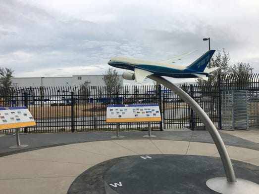 A Boeing 787 sculpture provides a fitting welcome to