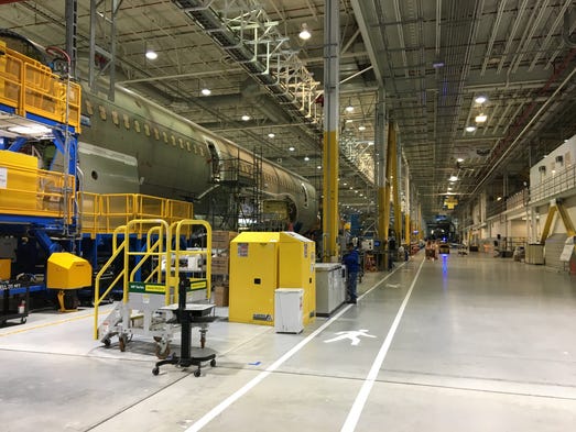 Boeing Dreamliner fuselages are worked on at the company's