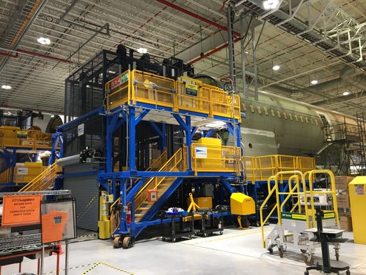 Boeing Dreamliner fuselages are worked on at the company's