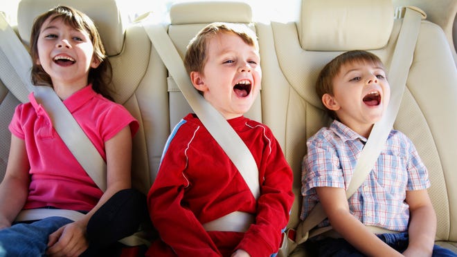 Children in Back Seat of Van