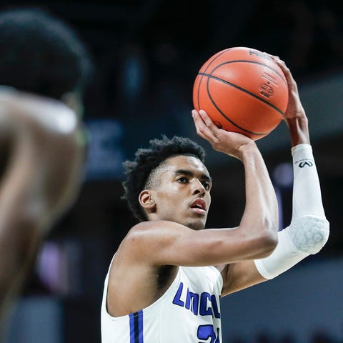 Ypsilanti Lincoln's Emoni Bates attempts for a fre