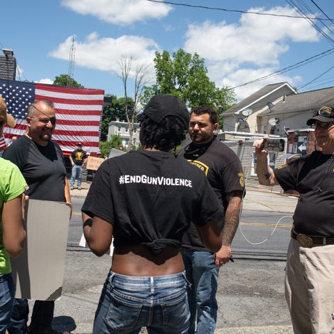 Oath Keeper President Stewart Rhodes, center left,