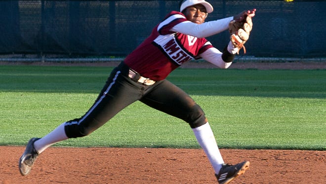 New Mexico State shortstop Rachel Rodriguez has this hard hit ball go off the end of her glove as the Aggies lost two games to No. 15 Missouri on Saturday evening at the NMSU Softball Complex.