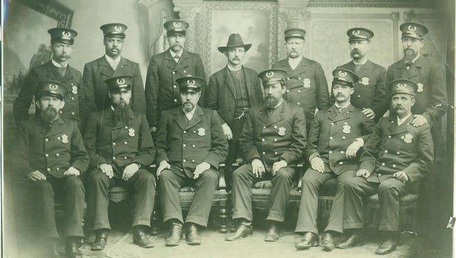 Richmond police force in the latter part of the 19th century.  Front row to back, left to right: Frank Braucamp, Henry Westenburg, Joseph Betzoid, John Bennett, Charles Chrissman, Bloom Zane, Richard Williams, Willis Carter, Argippa Scott, Mayor Thomas Bennett, Police Chief Joseph Flemming, Thomas Yeager and Fred Bartel.  Some of these men - Willis Carter, Henry Westenbrug, Charles Chrissman and John Bennett  – are in today’s story.