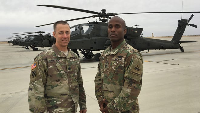 Lt. Col. Chris Crotzer, left, and Command Sgt. Maj. Terrence Reyes Jr. are the command team for 1st Battalion, 501st Aviation Regiment. They will relinquish their positions Friday.